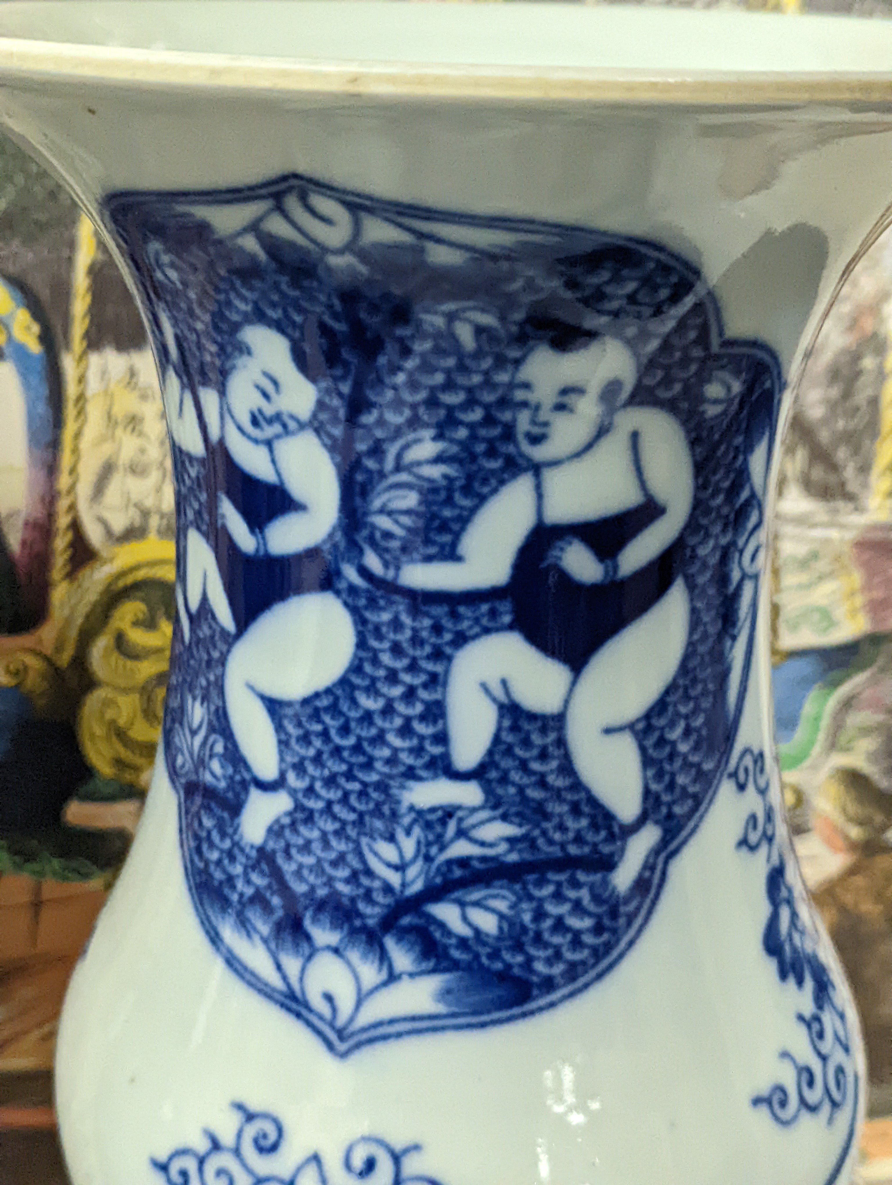 A pair of Chinese blue and white vases on stands and 6 further wood stands. Vases 35cm